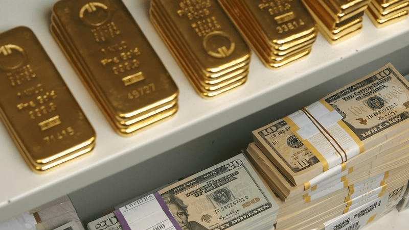 Gold rises as weak dollar offset fears of rate hike